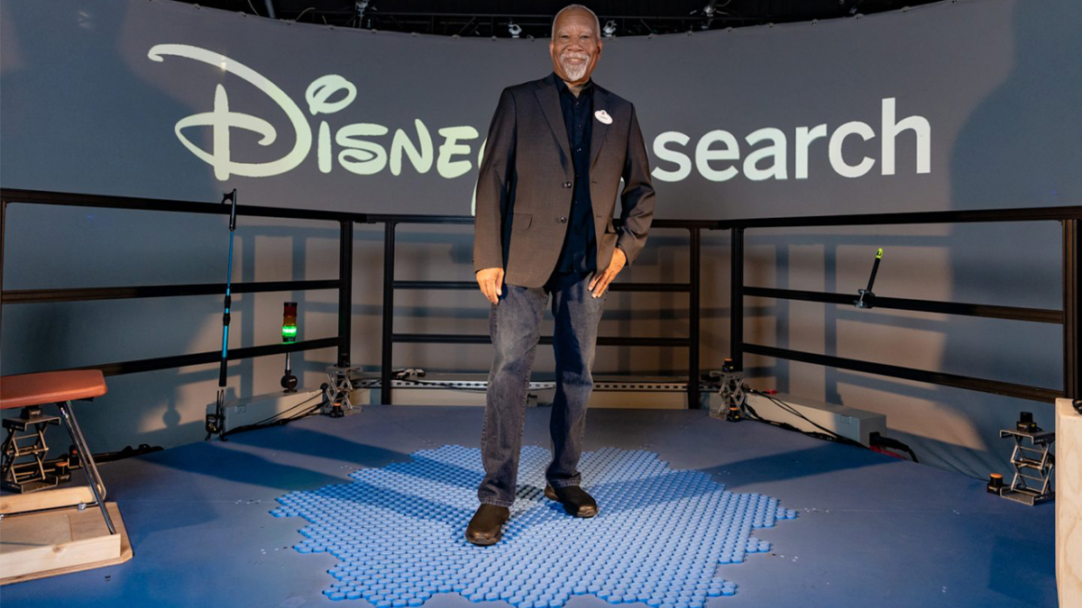 Lanny Smoot, standing on the HoloTile floor. (Credit: Disney Parks) 