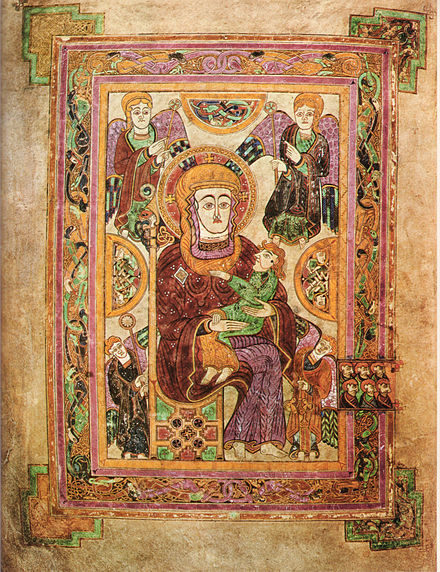 A Book from Across the Ages, Letters and Beasts Coiling Over the Pages